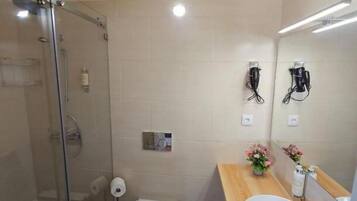 Double Room, Garden View | Bathroom | Shower, hair dryer, towels, soap