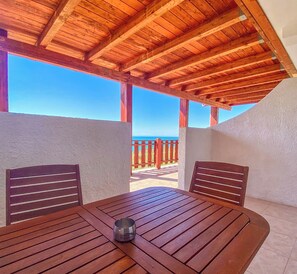 Apartment, Balcony, Sea View | Outdoor dining