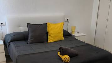 2 dormitorios, tabla de planchar con plancha, wifi y ropa de cama