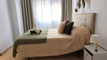 2 habitaciones, tabla de planchar con plancha, wifi y ropa de cama