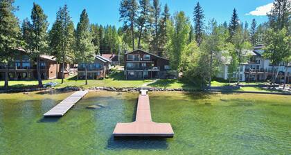Lakefront McCall retreat with 6 bedrooms, 3 baths, hot tub, dock, and views.