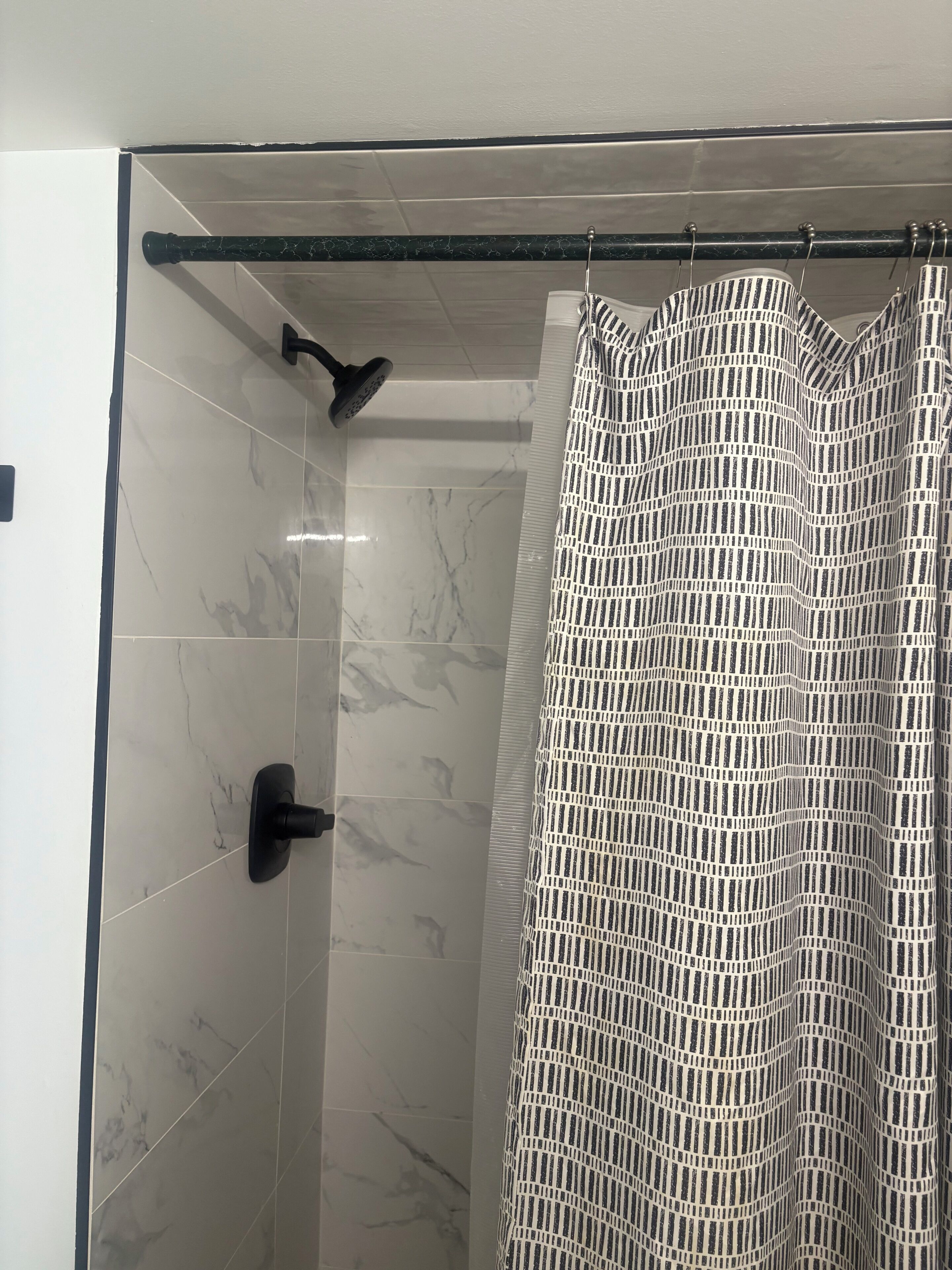 Shower, hair dryer, soap, toilet paper