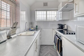 Quarto casal luxo | Cozinha privada