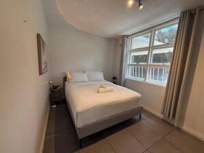 Desk, iron/ironing board, WiFi, bed sheets - Chic Waterfront Stay with Prime Sydney Access (Lavender Bay)