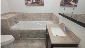 Shower, jetted bath, hair dryer, towels