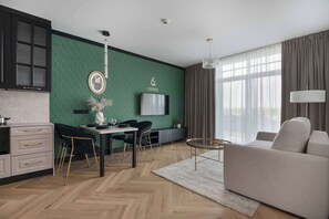 TV, offices - Elegant Apartment with Balcony | Air Conditioning | Close to the Spa. (Ciechocinek)