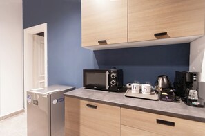 Studio, 1 grand lit, vue ville | Coin cuisine privé