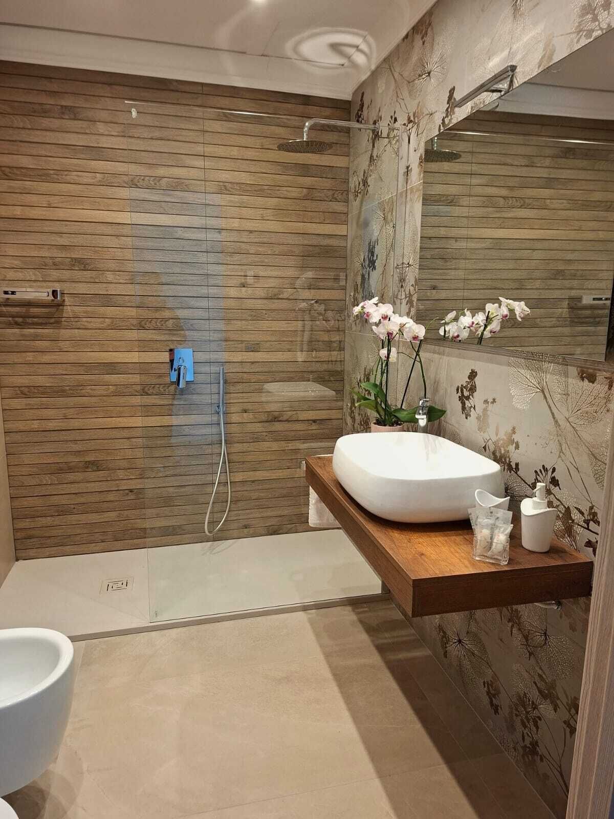 Triple Room, Sea View (Leo) | Bathroom | Shower, hair dryer, towels, soap