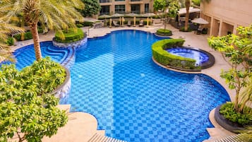 2 outdoor pools, open 8:00 AM to 10:00 PM, pool umbrellas, pool loungers