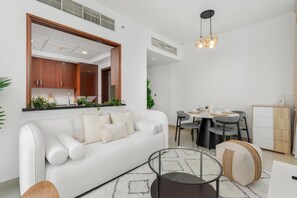 City Apartment, 2 Bedrooms, Lake View | Dining room - Gala Guests - 29 Boulevard Residences (Dubai)