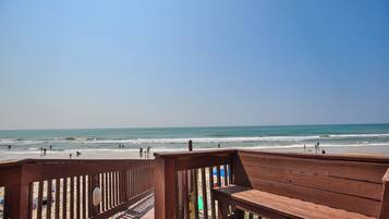 On the beach, sun loungers, beach towels