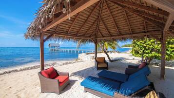 On the beach, sun loungers, beach towels