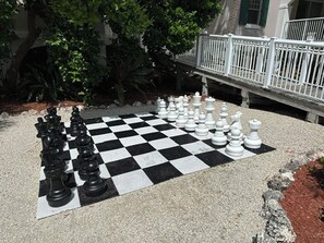 A chessboard set up outdoors with pieces arranged for a game. - Superb 2-bedroom condo w/ocean view at Hyatt Windward Pointe in vibrant Key West (Key West)