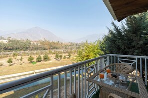 Habitación Deluxe | Restaurante al aire libre