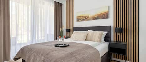 1 habitación, tabla de planchar con plancha, cuna de viaje y wifi