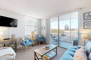 TV, offices - Renovated Beachfront Condo: Modern Comfort, River Views & Endless Relaxation! (Bonita Springs)