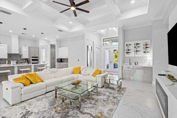 TV, offices - Luxe brand-new home with designer interior, lanai, private pool, & spa (Bonita Springs)