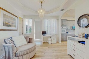 TV, fireplace, offices - Snowbird-friendly retreat with WiFi, private pool, washer/dryer, & dog friendly (Cape Coral)