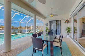 Outdoor dining - Snowbird-friendly retreat with WiFi, private pool, washer/dryer, & dog friendly (Cape Coral)