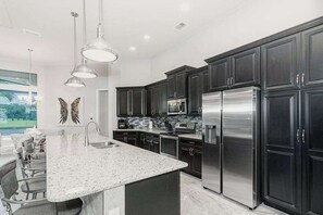 Fridge, microwave, oven, stovetop - Snowbird-Friendly Home w/ Private Pool, High-Speed WiFi, Central AC, & W/D (Cape Coral)