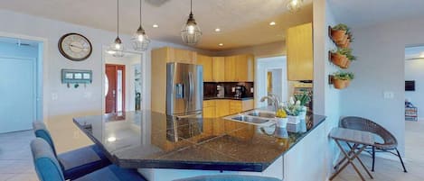 Coffee/tea maker, fridge, microwave, oven