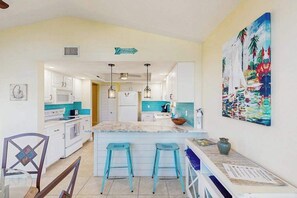 Fridge, microwave, oven, stovetop - Canalfront Home with WiFi, Private Pool, & Dock w/ Gulf + River Access - Dogs OK (Cape Coral)