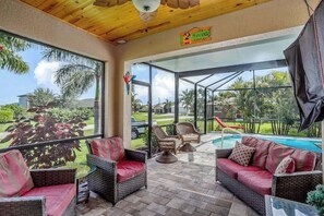 Terrace/patio - Serene home on a corner lot with a private pool, pool spa, AC, & washer/dryer (Cape Coral)