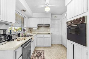 Fridge, microwave, oven, stovetop - Private Canal-Front Retreat with Pool, Lanai, Patio & Waterfront Deck (Cape Coral)