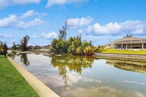 Property grounds - Spacious Canal-Front home with private pool, lanai, Game Room (Cape Coral)