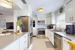 Fridge, microwave, oven, stovetop - Gorgeous coastal home with private pool and close to everything (Cape Coral)
