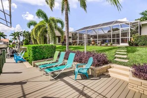 Terrace/patio - Canal-front home w/ private pool, hot tub, dock & kayaks/paddleboards -1 dog OK (Cape Coral)