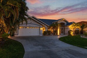 Exterior - Canal-side gem with screened pool, boat dock & Gulf access - near dining (Cape Coral)
