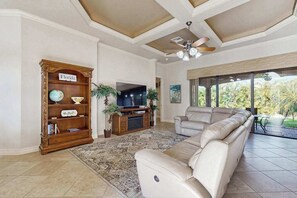 TV, offices - Elegant Cape Coral Retreat with Lanai, Grill & Prime Location (Cape Coral)