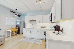 Fridge, microwave, oven, stovetop - Old Florida bungalow with WiFi, AC, washer/dryer, & patio - walk to beach (Englewood)