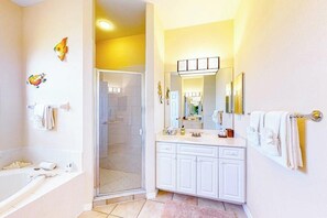 Shower, hair dryer, towels - Waterfront home with screened pool, patio, grill, foosball, AC, & W/D (Cape Coral)