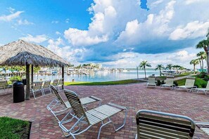 Terrace/patio - Charming waterfront condo with balcony views, hot tub, tennis courts & pool (Marco Island)