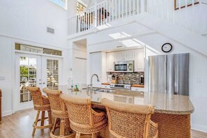 Fridge, microwave, oven, stovetop - Stunning canal-front home with pools, AC, W/D & hammock (Bokeelia)