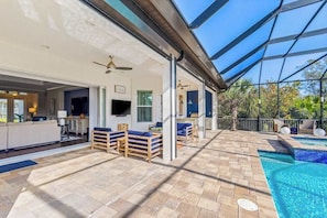 Terrace/patio - Luxe, waterfront home with pool, spa, dock & gorgeous backyard (Bonita Springs)