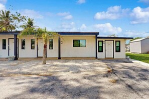 Exterior - Canal front apartment with waterfront views, private patio, and yard (Bonita Springs)