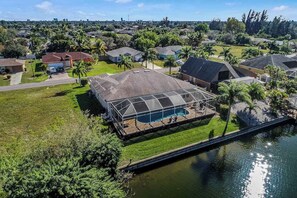 Exterior - Spacious dog-friendly home with private pool, canal views & private grill (Cape Coral)