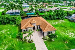Exterior - Dog-friendly home on the canal with AC & pool with spa - snowbird-friendly (Cape Coral)