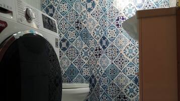 Hair dryer, towels, soap, toilet paper