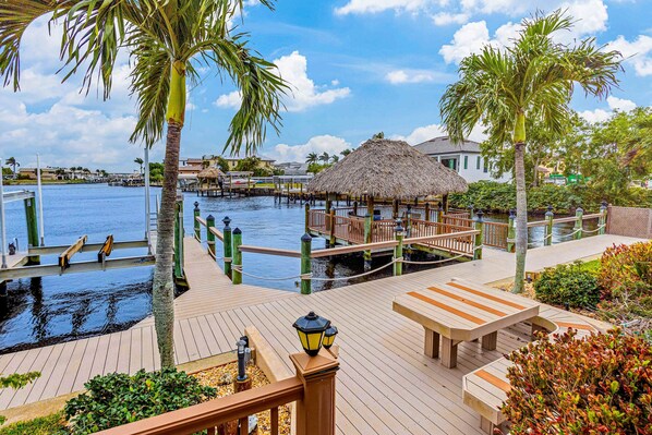 Terrace/patio - Gulf view home with heated pool, alfresco dining, dock, W/D, & AC (Cape Coral)