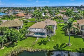 Exterior - Updated lake-view luxury home with private heated pool & jetted tub (Cape Coral)