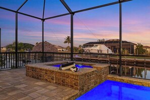 Terrace/patio - Open home with heated pool, dock, grill, beach gear, smart TVs, W/D, & AC (Cape Coral)