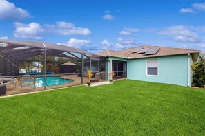 Pool - Dog-friendly home with private heated saltwater pool, patio, grill, & streaming (Cape Coral)