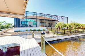 Terrace/patio - Amazing dog-friendly riverfront oasis w/ private pool, patio, dock & EV charger (Cape Coral)