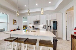 Fridge, microwave, oven, stovetop - Dog-friendly Waterfront home with private pool, on-site fishing (Cape Coral)