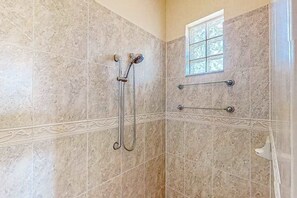 Shower, hair dryer - Canal-front home with pool, outdoor kitchen, & private dock - dog-friendly (Cape Coral)