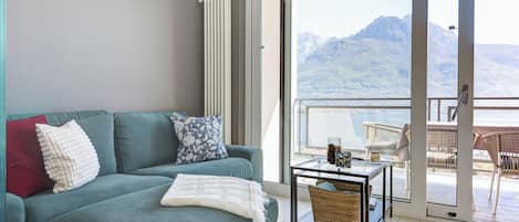 Apartment, 2 Bedrooms, Balcony, Lake View | Living area | 30-inch TV with satellite channels